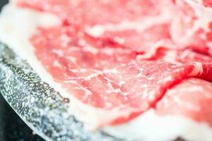 Fresh marble raw beef steak, meat texture close up photo