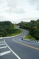 Beautiful curved road look like number 3 on the high mountain in Nan province, Thailand. photo