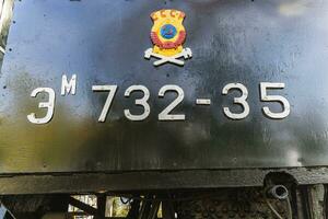 Text and numbers on a metal surface with the symbols of the USSR for design and commercial use photo