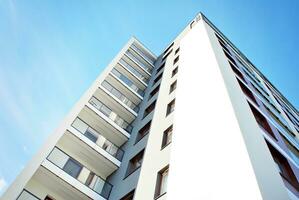 Modern and new apartment building. Multistoried, modern, new and stylish living block of flats. photo