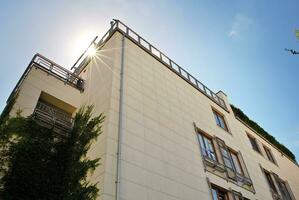 Modern and new apartment building. Multistoried, modern, new and stylish living block of flats. photo