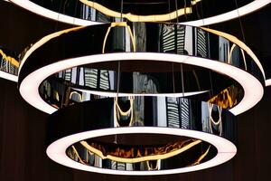 Abstract interior fragment. Stylized illumination with modern LED lamps. photo