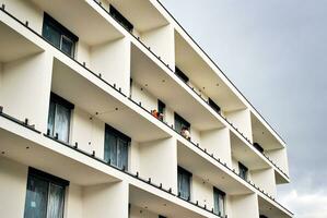 Modern and new apartment building. Multistoried, modern, new and stylish living block of flats. photo