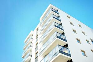 Modern and new apartment building. Multistoried, modern, new and stylish living block of flats. photo