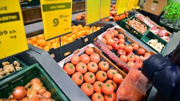 Warsaw, Poland. 8 January 2024. Inside supermarket Netto. Fresh fruits and vegetables. photo