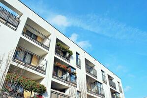 Modern and new apartment building. Multistoried, modern, new and stylish living block of flats. photo