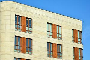 Modern and new apartment building. Multistoried, modern, new and stylish living block of flats. photo