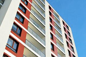 Modern and new apartment building. Multistoried, modern, new and stylish living block of flats. photo