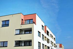 Modern and new apartment building. Multistoried, modern, new and stylish living block of flats. photo