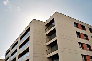 Modern and new apartment building. Multistoried, modern, new and stylish living block of flats. photo