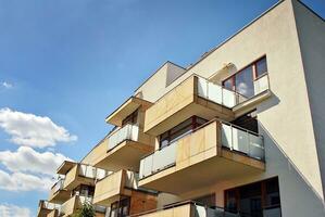 Modern and new apartment building. Multistoried, modern, new and stylish living block of flats. photo