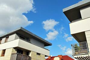 Modern and new apartment building. Multistoried, modern, new and stylish living block of flats. photo