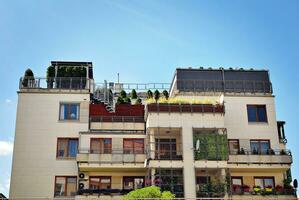 Modern and new apartment building. Multistoried, modern, new and stylish living block of flats. photo