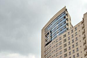 Modern and new apartment building. Multistoried, modern, new and stylish living block of flats. photo