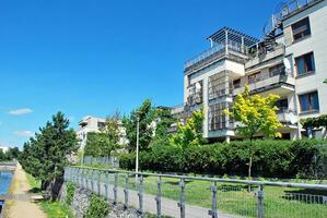 Modern and new apartment building. Multistoried, modern, new and stylish living block of flats. photo