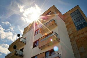 Modern and new apartment building. Multistoried, modern, new and stylish living block of flats. photo