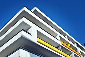 Modern and new apartment building. Multistoried, modern, new and stylish living block of flats. photo
