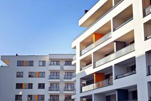 Modern and new apartment building. Multistoried, modern, new and stylish living block of flats. photo