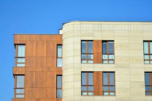 Modern and new apartment building. Multistoried, modern, new and stylish living block of flats. photo