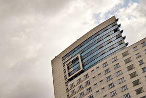 Modern and new apartment building. Multistoried, modern, new and stylish living block of flats. photo