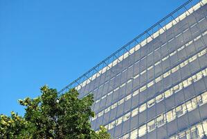 Modern and new apartment building. Multistoried, modern, new and stylish living block of flats. photo