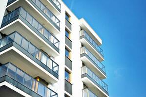 Modern and new apartment building. Multistoried, modern, new and stylish living block of flats. photo