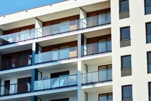 Modern and new apartment building. Multistoried, modern, new and stylish living block of flats. photo