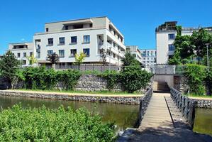 Modern and new apartment building. Multistoried, modern, new and stylish living block of flats. photo