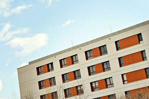 Modern and new apartment building. Multistoried, modern, new and stylish living block of flats. photo