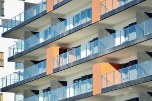 Modern and new apartment building. Multistoried, modern, new and stylish living block of flats. photo