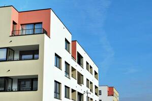 Modern and new apartment building. Multistoried, modern, new and stylish living block of flats. photo