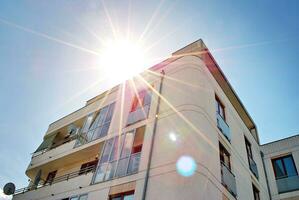 Modern and new apartment building. Multistoried, modern, new and stylish living block of flats. photo