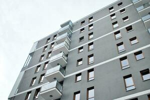 Modern and new apartment building. Multistoried, modern, new and stylish living block of flats. photo