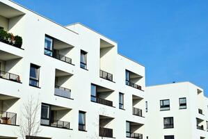 Modern and new apartment building. Multistoried, modern, new and stylish living block of flats. photo