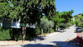 Voula Attica Greece 2018 Greek Typical idyllic street at dawn and sunrise in Voula Greece. video