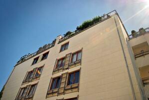 Modern and new apartment building. Multistoried, modern, new and stylish living block of flats. photo