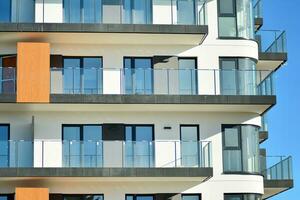 Modern and new apartment building. Multistoried, modern, new and stylish living block of flats. photo