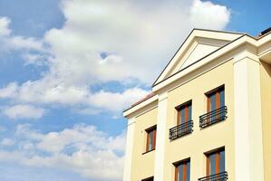 Modern and new apartment building. Multistoried, modern, new and stylish living block of flats. photo