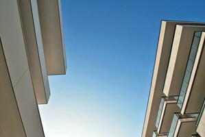 Modern and new apartment building. Multistoried, modern, new and stylish living block of flats. photo