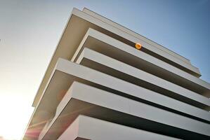 Modern and new apartment building. Multistoried, modern, new and stylish living block of flats. photo