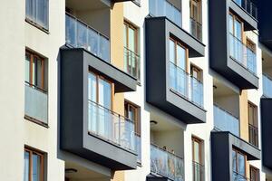 Modern and new apartment building. Multistoried, modern, new and stylish living block of flats. photo