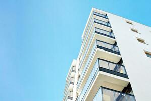 Modern and new apartment building. Multistoried, modern, new and stylish living block of flats. photo