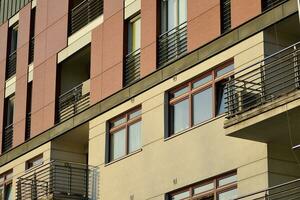 Modern and new apartment building. Multistoried, modern, new and stylish living block of flats. photo