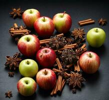 ai generado manzanas, canela palos y estrella anís en un negro antecedentes foto