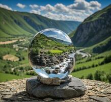 ai generado cristal pelota con el imagen de un montaña río en el antecedentes. foto