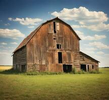 AI generated Old barn on a green meadow against a blue sky with clouds photo