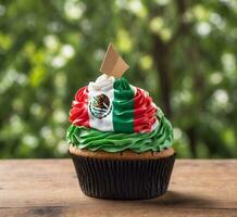 AI generated Cupcake with flag of mexico on top on wooden table photo