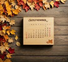 AI generated Calendar September 2024 with autumn leaves on a wooden background. Top view. photo