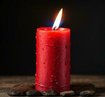 AI generated Burning red candle on a wooden table on a black background. photo