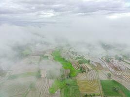 the beauty of the morning panorama with sunrise in indonesia village photo